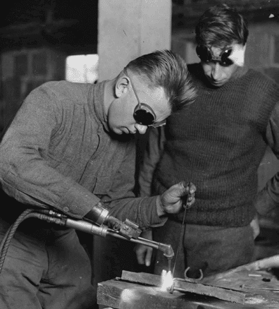 Two People Welding